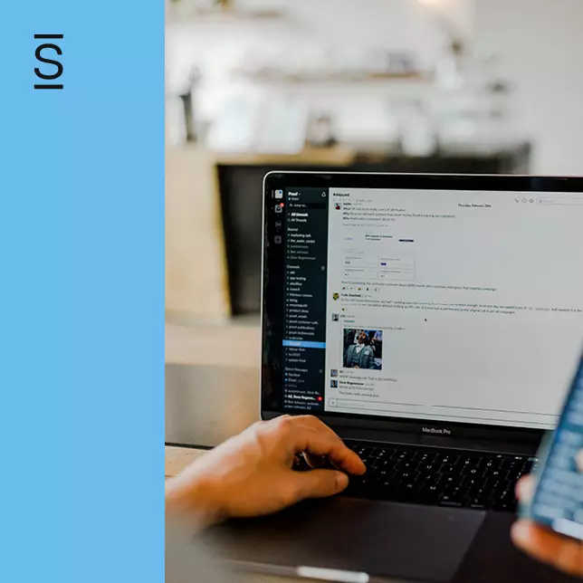 Essential communications - shot of a laptop screen showing Slack chat