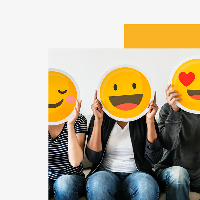 Employee experience metrics - three people holding cutouts of emojis