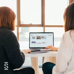 Intranet packaged solutions - two female employees looking at a computer screen